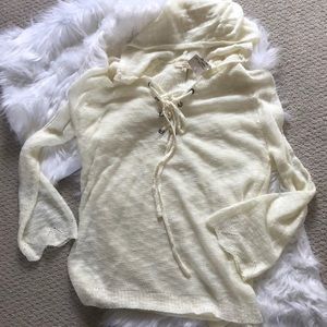 Light sweater with lace up front and hood